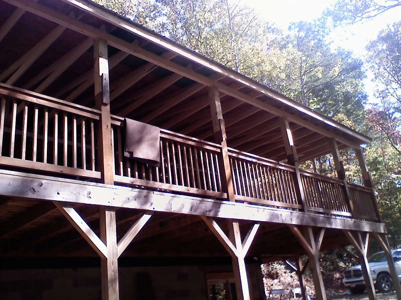 Timber framing under a new elevated porch and deck — Roof Leak Repair in Olive Branch by Roofing Brothers